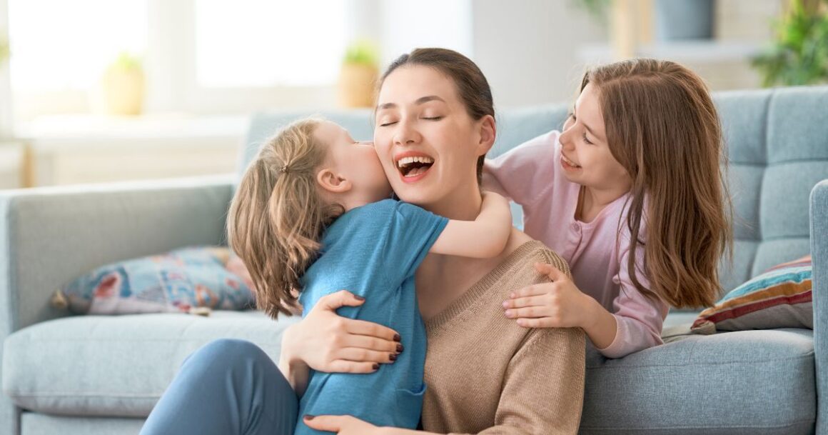 Mother with children in cozy setting.